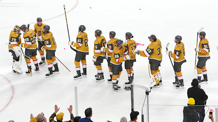 Apr 15, 2026; Las Vegas, Nevada, USA; Vegas Golden Knights players celebrate after defeating the Seattle Kraken 4-1 at T-Mobile Arena. Mandatory Credit: Stephen R. Sylvanie-Imagn Images