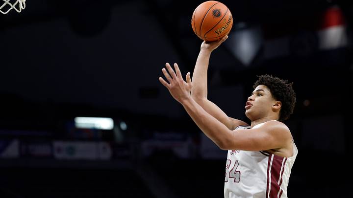 Logan-Rogersville's Titus Moore (34) puts up a shot during a Class 4 semifinal game against Vashon, Friday, March 20, 2026, at Mizzou Arena in Columbia, Mo. Logan-Rogersville's Titus Moore (34) puts up a shot during a Class 4 semifinal game against Vashon, Friday, March 20, 2026, at Mizzou Arena in Columbia, Mo.