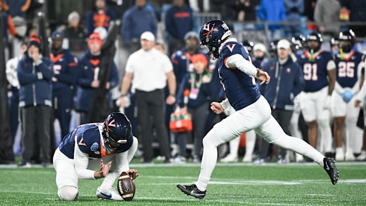 Dec 6, 2025; Charlotte, NC, USA; Virginia Cavaliers kicker Will Bettridge (41) kicks a field goal in the third quarter against the Duke Blue Devils during the 2025 ACC Championship game at Bank of America Stadium. Mandatory Credit: Bob Donnan-Imagn Images