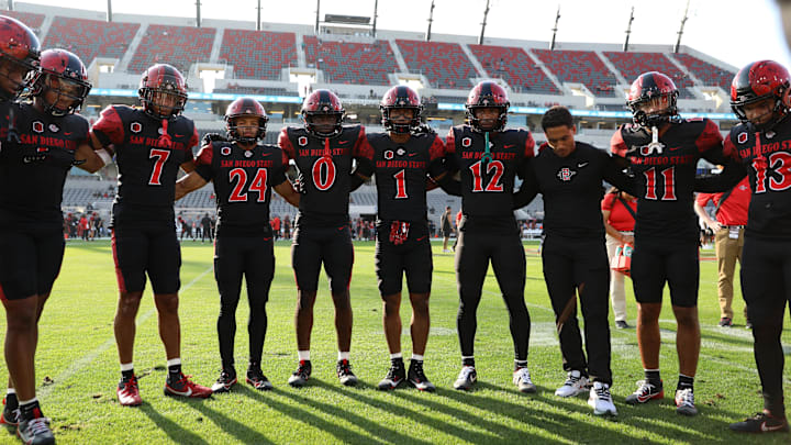 Oct 5, 2024; San Diego, California, USA; San Diego State Aztecs huddle before the game against the Hawaii Rainbow Warriors at Snapdragon Stadium.
