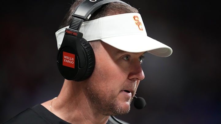 Dec 30, 2025; San Antonio, TX, USA; Southern California Trojans head coach Lincoln Riley watches in the first half against the TCU Horned Frogs during the Alamo Bowl at Alamodome. Mandatory Credit: Kirby Lee-Imagn Images