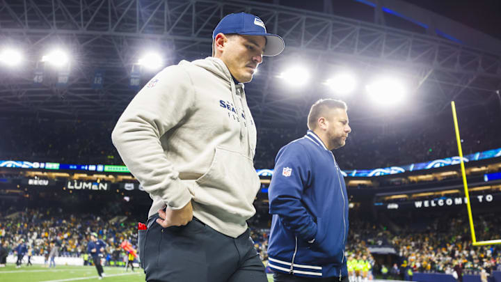 Dec 15, 2024; Seattle, Washington, USA; Seattle Seahawks head coach Mike Macdonald, left, walks to the locker room following a loss against the Green Bay Packers at Lumen Field. Mandatory Credit: Joe Nicholson-Imagn Images Dec 15, 2024; Seattle, Washington, USA; Seattle Seahawks head coach Mike Macdonald, left, walks to the locker room following a loss against the Green Bay Packers at Lumen Field. Mandatory Credit: Joe Nicholson-Imagn Images