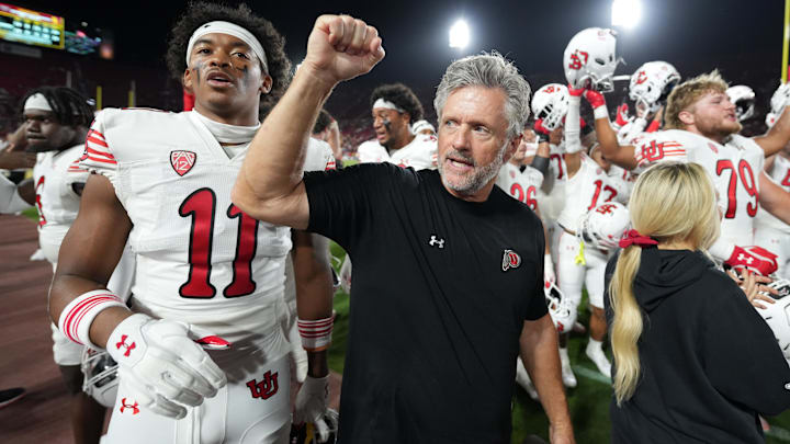 Oct 21, 2023; Los Angeles, California, USA; Utah Utes head coach Kyle Whittingham celebrates after the game against the Southern California Trojans at United Airlines Field at Los Angeles Memorial Coliseum. Mandatory Credit: Kirby Lee-Imagn Images Oct 21, 2023; Los Angeles, California, USA; Utah Utes head coach Kyle Whittingham celebrates after the game against the Southern California Trojans at United Airlines Field at Los Angeles Memorial Coliseum. Mandatory Credit: Kirby Lee-Imagn Images
