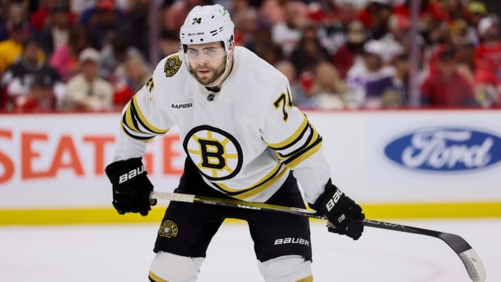 May 14, 2024; Sunrise, Florida, USA; Boston Bruins left wing Jake DeBrusk (74) looks on against the Florida Panthers during the first period in game five of the second round of the 2024 Stanley Cup Playoffs at Amerant Bank Arena. Mandatory Credit: Sam Navarro-USA TODAY Sports May 14, 2024; Sunrise, Florida, USA; Boston Bruins left wing Jake DeBrusk (74) looks on against the Florida Panthers during the first period in game five of the second round of the 2024 Stanley Cup Playoffs at Amerant Bank Arena. Mandatory Credit: Sam Navarro-USA TODAY Sports