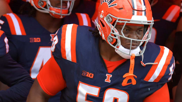 Sep 14, 2024; Champaign, Illinois, USA;  Illinois Fighting Illini offensive lineman Melvin Priestly (58) during the first half at Memorial Stadium. Mandatory Credit: Ron Johnson-Imagn Images