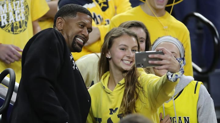 Jalen Rose former Michigan Wolverine takes a photo with fans Tuesday, November 5, 2019 at the Crisler Center in Ann Arbor, Mich.

Michigan Basketball