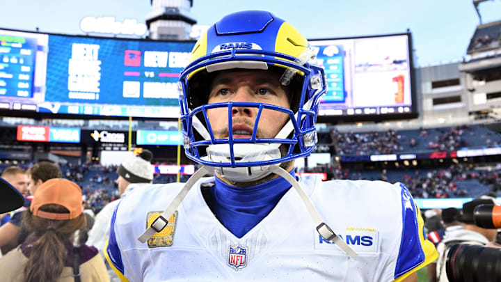 Nov 17, 2024; Foxborough, Massachusetts, USA; Los Angeles Rams quarterback Matthew Stafford (9) walks off of the field after a game against the New England Patriots at Gillette Stadium. Mandatory Credit: Brian Fluharty-Imagn Images