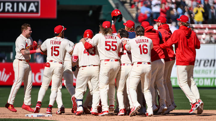 Mar 28, 2026; St. Louis, Missouri, USA; St. Louis Cardinals shortstop JJ Wetherholt (26) is mobbed by teammates after hitting a walk-off two run single against the Tampa Bay Rays during the tenth inning at Busch Stadium. Mandatory Credit: Jeff Curry-Imagn Images
