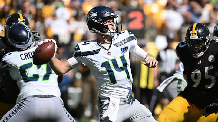 Sep 14, 2025; Pittsburgh, Pennsylvania, USA; Seattle Seahawks quarterback Sam Darnold (14) throws a pass while being pressured by Pittsburgh Steelers defensive tackle Keeanu Benton (95) during the second half at Acrisure Stadium. Mandatory Credit: Barry Reeger-Imagn Images