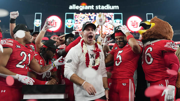 Dec 31, 2025; Las Vegas, NV, USA; Utah Utes interim coach Morgan Scalley celebrates with safety Tao Johnson (5) after victory against the Nebraska Cornhuskers during the SRS Distribution Las Vegas Bowl at Allegiant Stadium. 