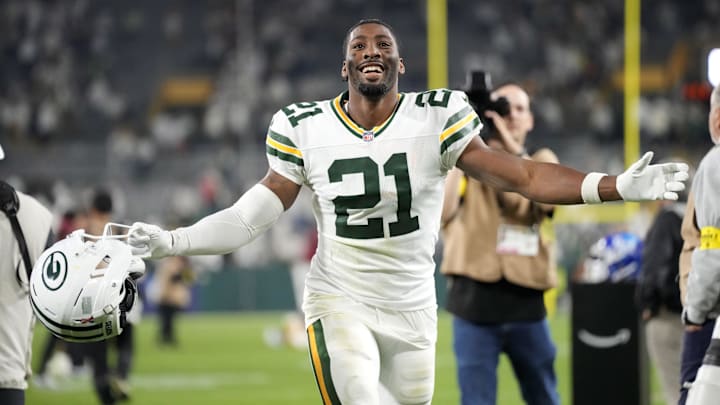 Sep 11, 2025; Green Bay, Wisconsin, USA;  Green Bay Packers cornerback Nate Hobbs (21) celebrates after defeating the Washington Commanders at Lambeau Field. Mandatory Credit: Jeff Hanisch-Imagn Images