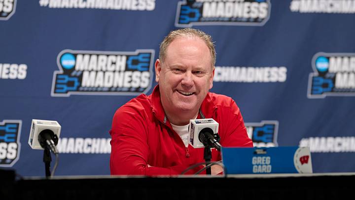 Mar 18, 2026; Portland, OR, USA; Wisconsin Badgers head coach Greg Gard answers questions from the media before a practice session ahead of the first round of the men's 2026 NCAA Tournament at Moda Center. Mandatory Credit: Troy Wayrynen-Imagn Images