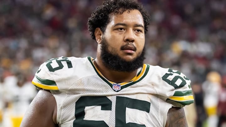 Oct 19, 2025; Glendale, Arizona, USA; Green Bay Packers guard Aaron Banks (65) against the Arizona Cardinals at State Farm Stadium.