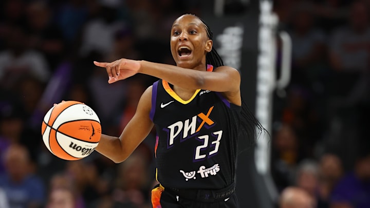 Sep 9, 2025; Phoenix, Arizona, USA; Phoenix Mercury guard Kiana Williams (23) against the Los Angeles Sparks during a WNBA game at PHX Arena. Mandatory Credit: Mark J. Rebilas-Imagn Images