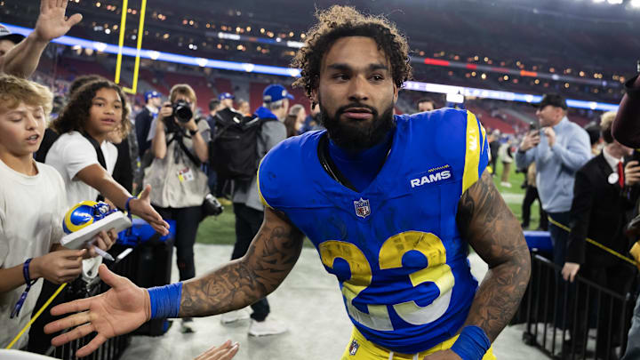 Jan 13, 2025; Glendale, AZ, USA; Los Angeles Rams running back Kyren Williams (23) celebrates after defeating the Minnesota Vikings during an NFC wild card game at State Farm Stadium. Mandatory Credit: Mark J. Rebilas-Imagn Images