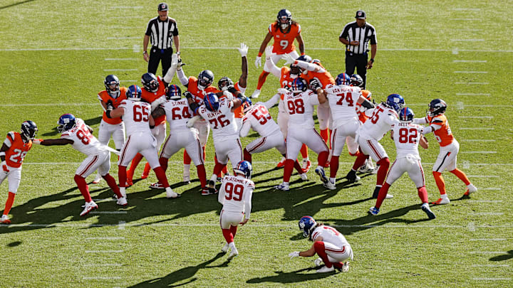Oct 19, 2025; Denver, Colorado, USA; New York Giants kicker Jude McAtamney (99) kicks a field goal during the second half against the Denver Broncos at Empower Field at Mile High.  