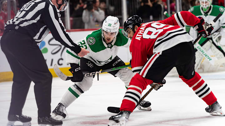 Apr 6, 2024; Chicago, Illinois, USA; Dallas Stars center Mavrik Bourque (22) and Chicago Blackhawks