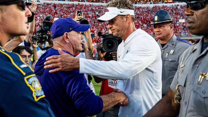 LSU head coach Brian Kelly and Ole Miss head coach Lane Kiffin shake hands after a college football game between Ole Miss and LSU at Vaught-Hemingway Stadium in Oxford, Miss., on Saturday, Sept. 27, 2025. Ole Miss defeated LSU 24-19.