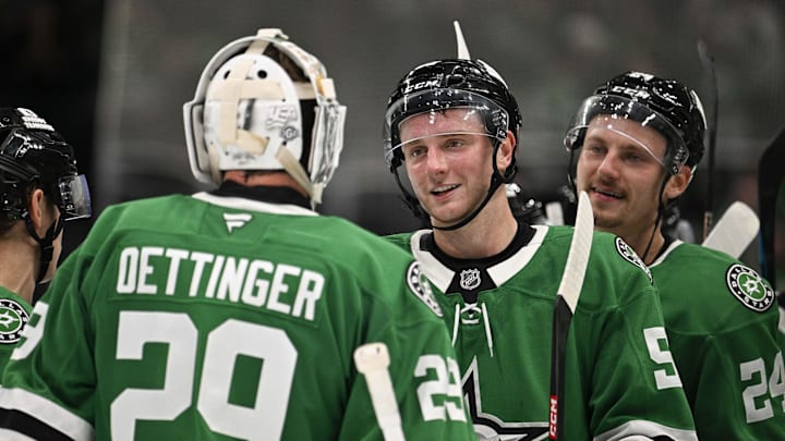 Oct 15, 2024; Dallas, Texas, USA; Dallas Stars goaltender Jake Oettinger (29) and defenseman Thomas Harley (55) and center Roope Hintz (24) celebrate the Stars victory over the San Jose Sharks at the American Airlines Center. Mandatory Credit: Jerome Miron-Imagn Images