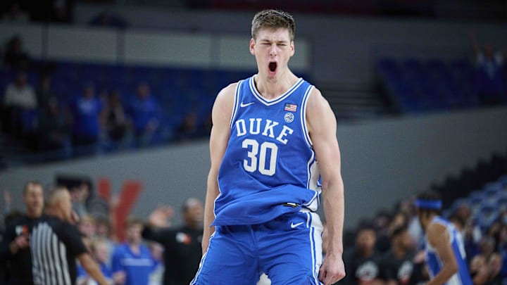 Nov 24, 2022; Portland, Oregon, USA; Duke Blue Devils center Kyle Filipowski (30) reacts after