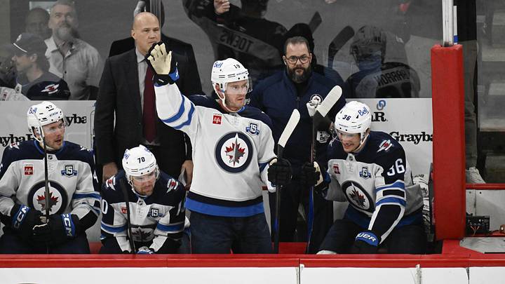 Jan 19, 2026; Chicago, Illinois, USA;  Winnipeg Jets center Jonathan Toews (19) acknowledges the crowd during the first period of his first game back at the United Center since leaving the Chicago Blackhawks.  Mandatory Credit: Matt Marton-Imagn Images