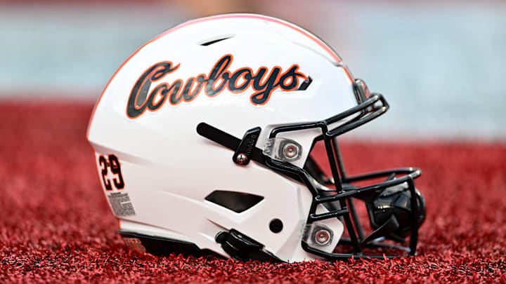 Nov 18, 2023; Houston, Texas, USA; A detailed view of an Oklahoma State Cowboys helmet on the sideline of the game against the Houston Cougars at TDECU Stadium. Mandatory Credit: Maria Lysaker-Imagn Images Nov 18, 2023; Houston, Texas, USA; A detailed view of an Oklahoma State Cowboys helmet on the sideline of the game against the Houston Cougars at TDECU Stadium. Mandatory Credit: Maria Lysaker-Imagn Images
