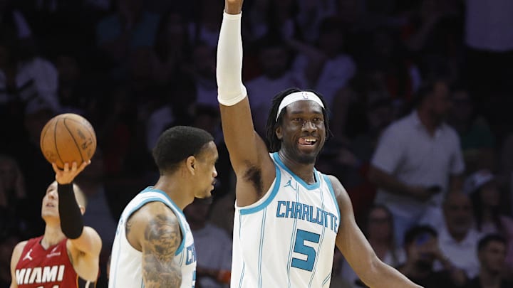 Mar 10, 2025; Miami, Florida, USA;  Charlotte Hornets guard DaQuan Jeffries (3) and  center Mark Williams (5) react during the second half at Kaseya Center. Mandatory Credit: Rhona Wise-Imagn Images