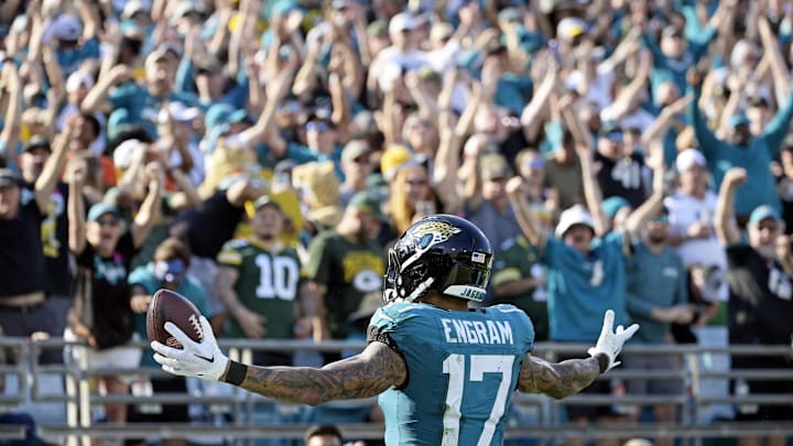 Oct 27, 2024; Jacksonville, Florida, USA; Jacksonville Jaguars tight end Evan Engram (17) catches a touchdown pass during the fourth quarter against the Green Bay Packers at EverBank Stadium. Mandatory Credit: Melina Myers-Imagn Images