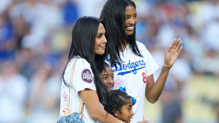 The family of Kobe Bryant, widow Vanessa Bryant and daughters Bianka Bryant, Capri Bryant and Natalia Bryan, pose during the game between the Toronto Blue Jays and the Los Angeles Dodgers at Dodger Stadium.