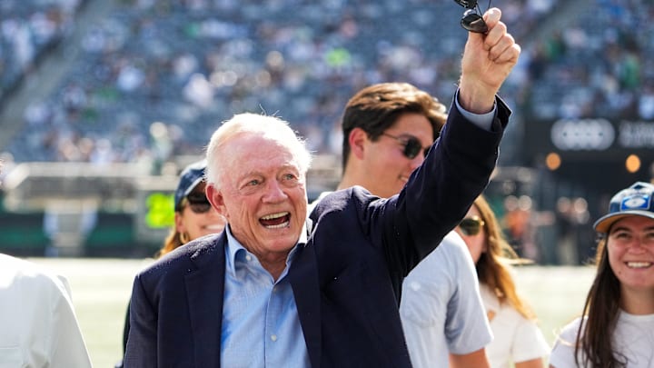 Dallas Cowboys Owner, President and general manager Jerry Jones waves on the field prior to a game against the New York Jets 