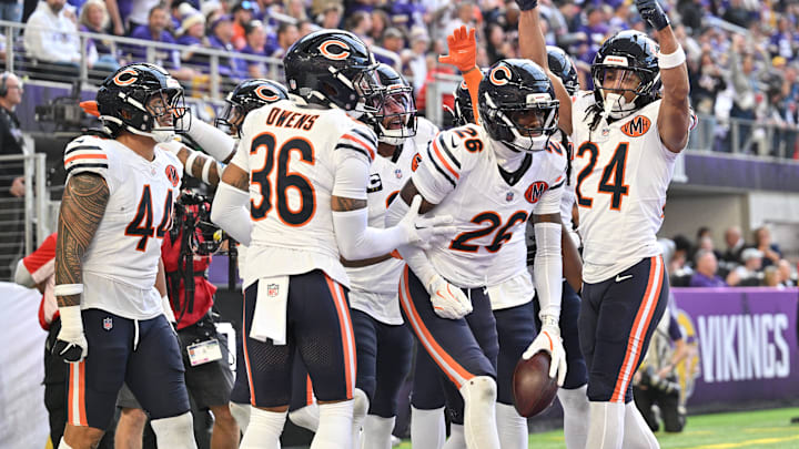 Nahshon Wright (26) celebrates with teammates after his interception at Minnesota.