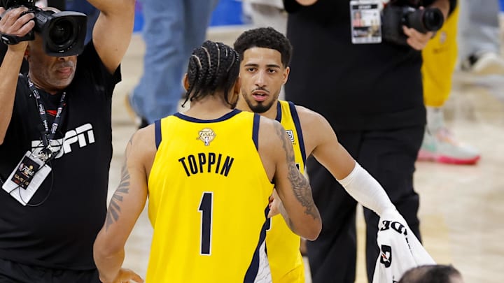 Jun 5, 2025; Oklahoma City, Oklahoma, USA; Indiana Pacers guard Tyrese Haliburton (0) and forward Obi Toppin (1) celebrate after the Pacers defeat the Oklahoma City Thunder during game one of the 2025 NBA Finals at Paycom Center. Mandatory Credit: Alonzo Adams-Imagn Images