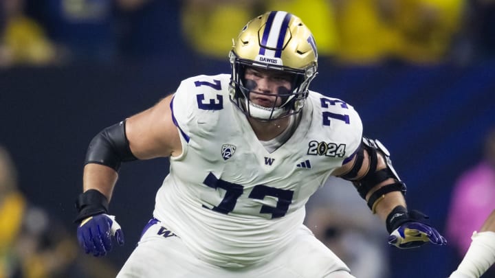 Jan 8, 2024; Houston, TX, USA; Washington Huskies offensive lineman Roger Rosengarten (73) against Jan 8, 2024; Houston, TX, USA; Washington Huskies offensive lineman Roger Rosengarten (73) against