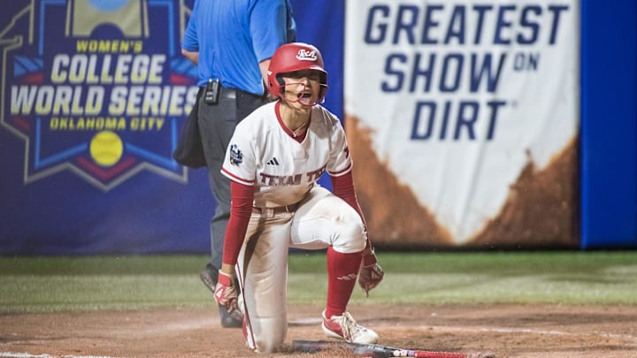 Texas Tech Red Raiders utility Makayla Garcia celebrates after scoring a run at the Women's College World Series.