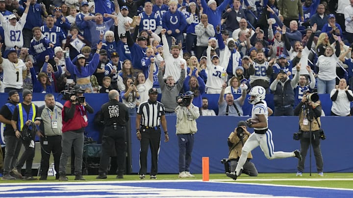 Dec 22, 2024; Indianapolis, Indiana, USA; Indianapolis Colts wide receiver Josh Downs (1) rushes for a touchdown during a game against the Tennessee Titans at Lucas Oil Stadium. Mandatory Credit: Christine Tannous/USA Today Network via Imagn Images Dec 22, 2024; Indianapolis, Indiana, USA; Indianapolis Colts wide receiver Josh Downs (1) rushes for a touchdown during a game against the Tennessee Titans at Lucas Oil Stadium. Mandatory Credit: Christine Tannous/USA Today Network via Imagn Images