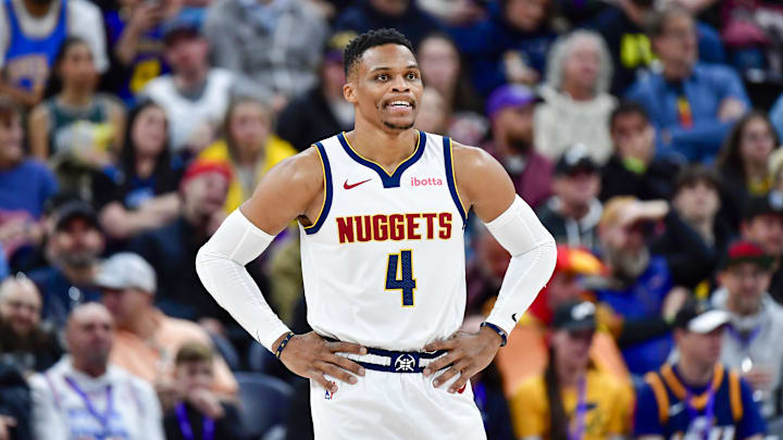 Nov 27, 2024; Salt Lake City, Utah, USA; Denver Nuggets guard Russell Westbrook (4) watches during a free throw against the Utah Jazz during the first half at the Delta Center. Mandatory Credit: Christopher Creveling-Imagn Images