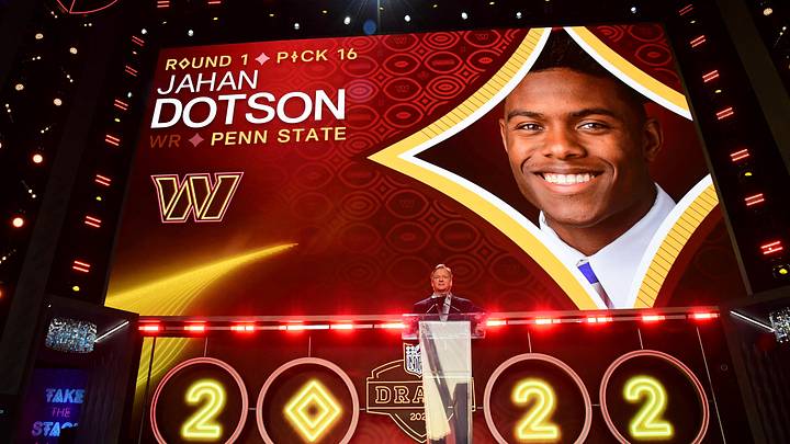 Apr 28, 2022; Las Vegas, NV, USA; Penn State wide receiver Jahan Dotson is announced as the sixteenth overall pick to the Washington Commanders by NFL commissioner Roger Goodell during the first round of the 2022 NFL Draft at the NFL Draft Theater. Mandatory Credit: Gary Vasquez-Imagn Images Apr 28, 2022; Las Vegas, NV, USA; Penn State wide receiver Jahan Dotson is announced as the sixteenth overall pick to the Washington Commanders by NFL commissioner Roger Goodell during the first round of the 2022 NFL Draft at the NFL Draft Theater. Mandatory Credit: Gary Vasquez-Imagn Images