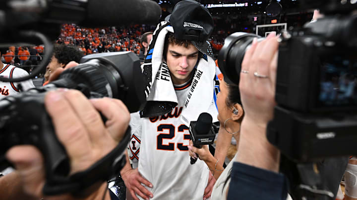 Mar 28, 2026; Houston, TX, USA; Illinois Fighting Illini guard Keaton Wagler (23) speaks to media after defeating the Iowa Hawkeyes in an Elite Eight game of the South Regional of the men's 2026 NCAA Tournament at Toyota Center. Mandatory Credit: Maria Lysaker-Imagn Images