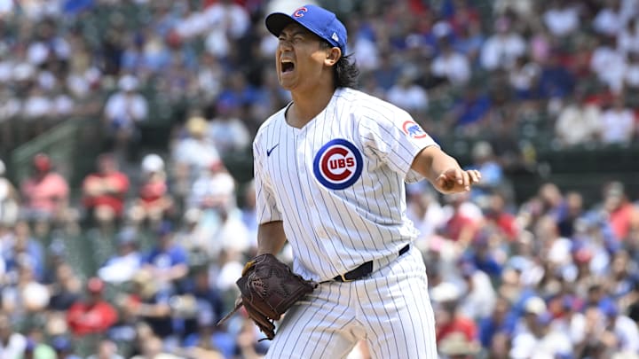 Jun 15, 2024; Chicago, Illinois, USA;  Chicago Cubs pitcher Shota Imanaga (18) reacts after he delivers a pitch during the first inning against the St. Louis Cardinals at Wrigley Field.