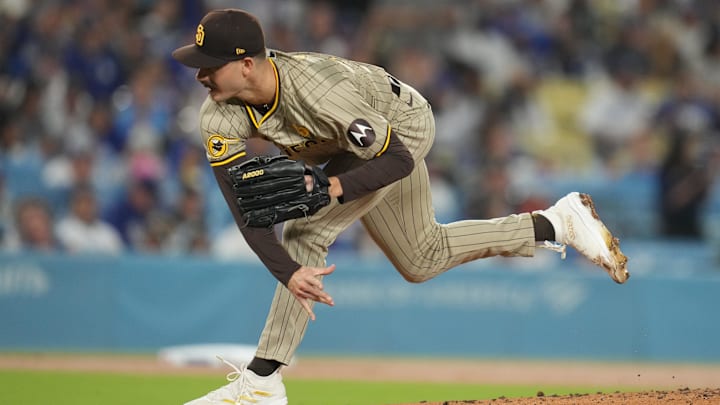 San Diego Padres starting pitcher Dylan Cease throws during a game against the Los Angeles Dodgers on Sept. 15 at Dodger Stadium. San Diego Padres starting pitcher Dylan Cease throws during a game against the Los Angeles Dodgers on Sept. 15 at Dodger Stadium.