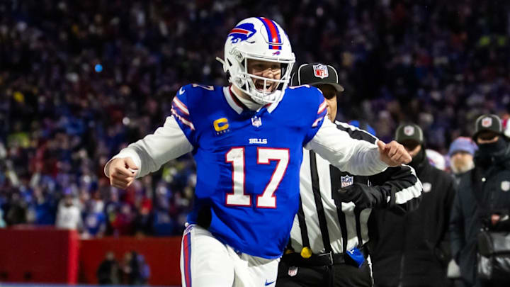Jan 21, 2024; Orchard Park, New York, USA; Buffalo Bills quarterback Josh Allen (17) celebrates a touchdown against the Kansas City Chiefs in the 2024 AFC divisional round game at Highmark Stadium.
