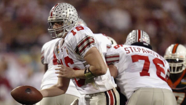 Craig Krenzel hands off the ball 