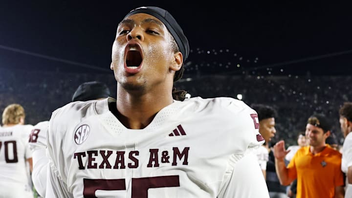 Sep 13, 2025; South Bend, Indiana, USA; Texas A&M Aggies defensive lineman Dealyn Evans (55) celebrates after their win against Notre Dame Fighting Irish at Notre Dame Stadium. Mandatory Credit: Trevor Ruszkowski-Imagn Images