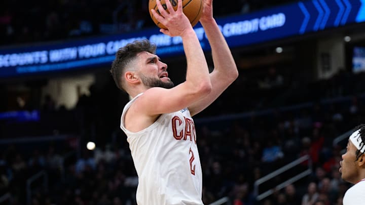 Feb 7, 2025; Washington, District of Columbia, USA; Cleveland Cavaliers guard Ty Jerome (2) takes a shot over Washington Wizards guard Bilal Coulibaly (0) during the fourth quarter at Capital One Arena. Mandatory Credit: Reggie Hildred-Imagn Images