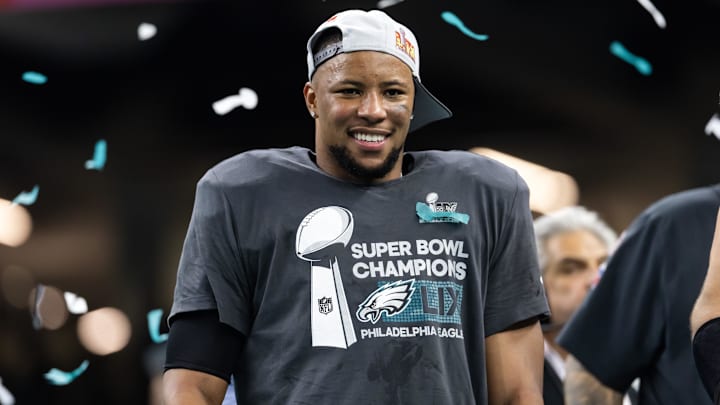 Feb 9, 2025; New Orleans, LA, USA; Philadelphia Eagles running back Saquon Barkley (26) celebrates after defeating the Kansas City Chiefs during Super Bowl LIX at Ceasars Superdome.