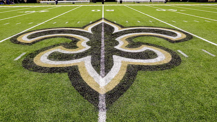 Oct 30, 2022; New Orleans, Louisiana, USA;  General view of the New Orleans Saints logo as the midfield logo fleur-de-lis after the game between the New Orleans Saints and the Las Vegas Raiders at Caesars Superdome. Mandatory Credit: Stephen Lew-Imagn Images