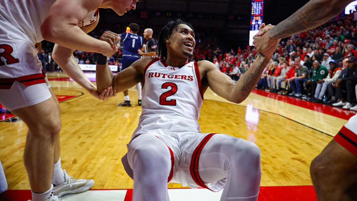 Nov 11, 2024; Piscataway, New Jersey, USA; Rutgers Scarlet Knights guard Dylan Harper (2) reacts after making basket during the second half against the St. Peter's Peacocks at Jersey Mike's Arena. Mandatory Credit: Vincent Carchietta-Imagn Images