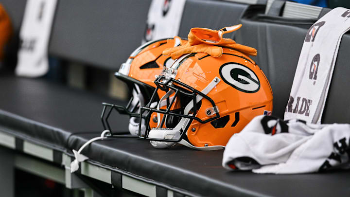 Dec 29, 2024; Minneapolis, Minnesota, USA;  A Green Bay Packers helmet sits ready before the game against the Minnesota Vikings at U.S. Bank Stadium. Mandatory Credit: Jeffrey Becker-Imagn Images