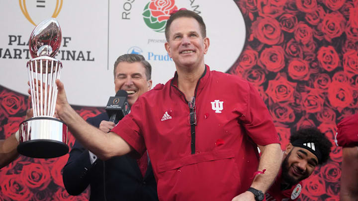 Jan 1, 2026; Pasadena, CA, USA; Indiana Hoosiers head coach Curt Cignetti holds the Leishman Trophy after victory over the Alabama Crimson Tide at the 2026 Rose Bowl and quarterfinal game of the College Football Playoff at Rose Bowl Stadium. 