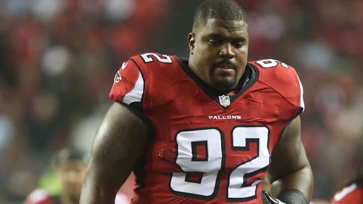 Aug 23, 2014; Atlanta, GA, USA; Atlanta Falcons nose tackle Travian Robertson (92) jogs toward the locker room after the first half of their game against the Tennessee Titans at the Georgia Dome. The Titans won 24-17. Mandatory Credit: Jason Getz-Imagn Images